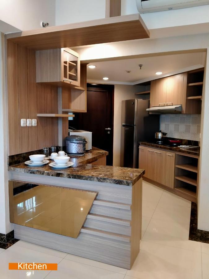 Apartemen Puncak Marina Surabaya Exterior photo